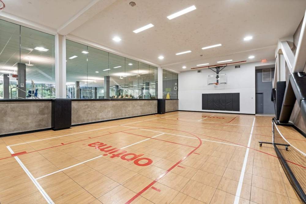 Indoor hybrid basketball and pickleball court at Optima Camelview